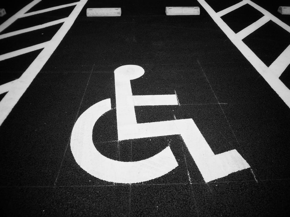 Parking bay with the universal wheelchair logo to signify disabled parking area