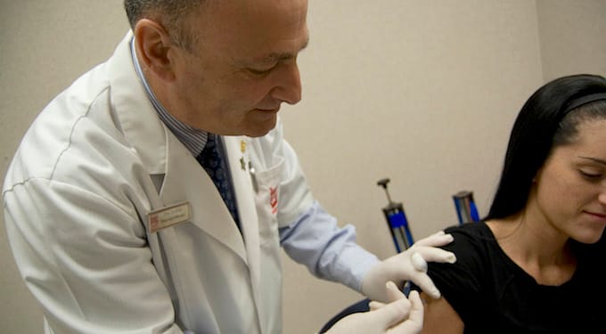 Flu shot_Walgreens pharmacist-patient_featured