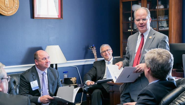 Rep. Brett Guthrie (R., Ky) meeting with the NACDS Board of Directors, with Hy-Vee's Randy Edeker and Thrifty White's Bob Narveson seated at left.