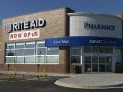 Rite Aid shrinks 3Q loss, but revenue slips