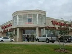 Walgreens  raises quarterly dividend 27.3%