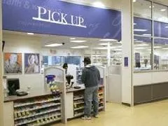 Rite Aid trims loss in third quarter