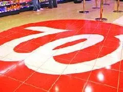 Walgreens 4Q profit down but beats forecasts