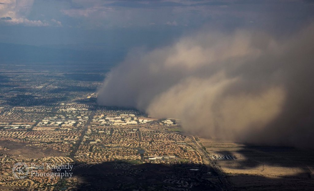 1st_Place_A_haboob_is_seen_rolling_across_Mesa_Arizona_from_my_window_on_a_flight_departing_Phoenix_by_Paul_Knightly_KnightlyPhoto_1024x1024