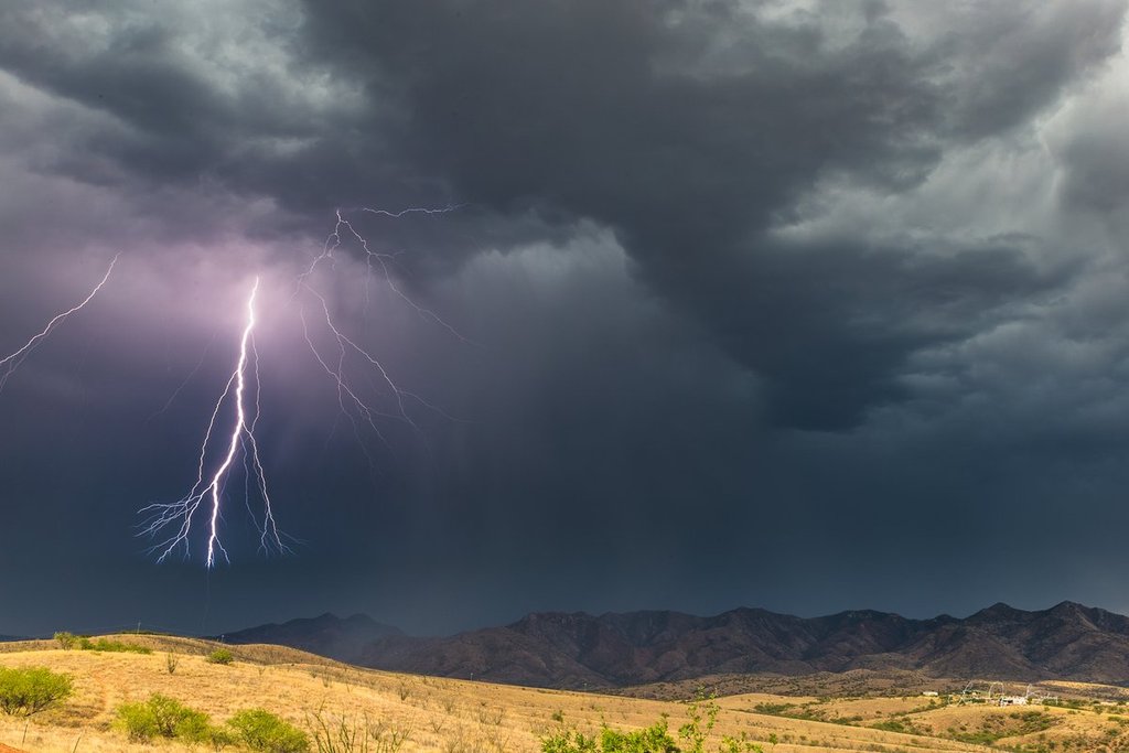 1st_Place_The_last_bolt_from_a_storm_over_the_Patagonia_Mountains_in_southern_AZ_by_Lori_Grace_Bailey_lorigraceaz_24500dc9-b7d4-43ea-88e6-60bf0ebf8fcd_1024x1024