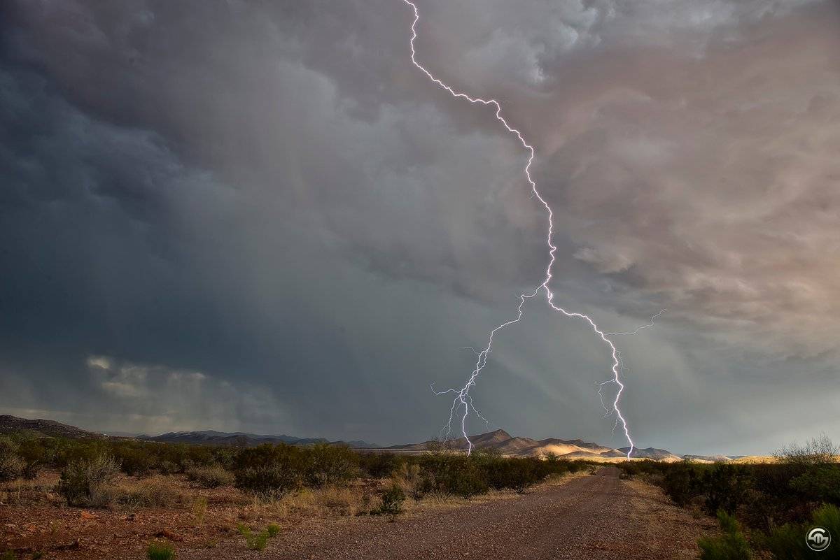 3rd Place Lightning striking southeast of Bisbee, AZ by Steven Maguire @StephenMaguire4