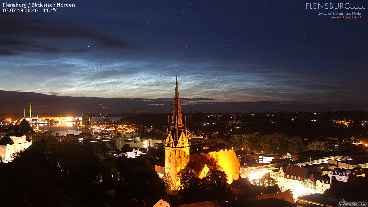 A beautiful night in Flensburg, Germany with noctilucent clouds by Tom Lowe @saloplarus