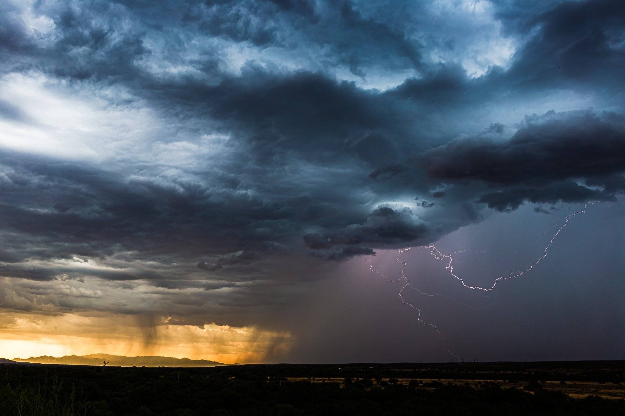 A colorful storm moves into the Green Valley area on July 15th by Lori Grace Bailey @lorigraceaz