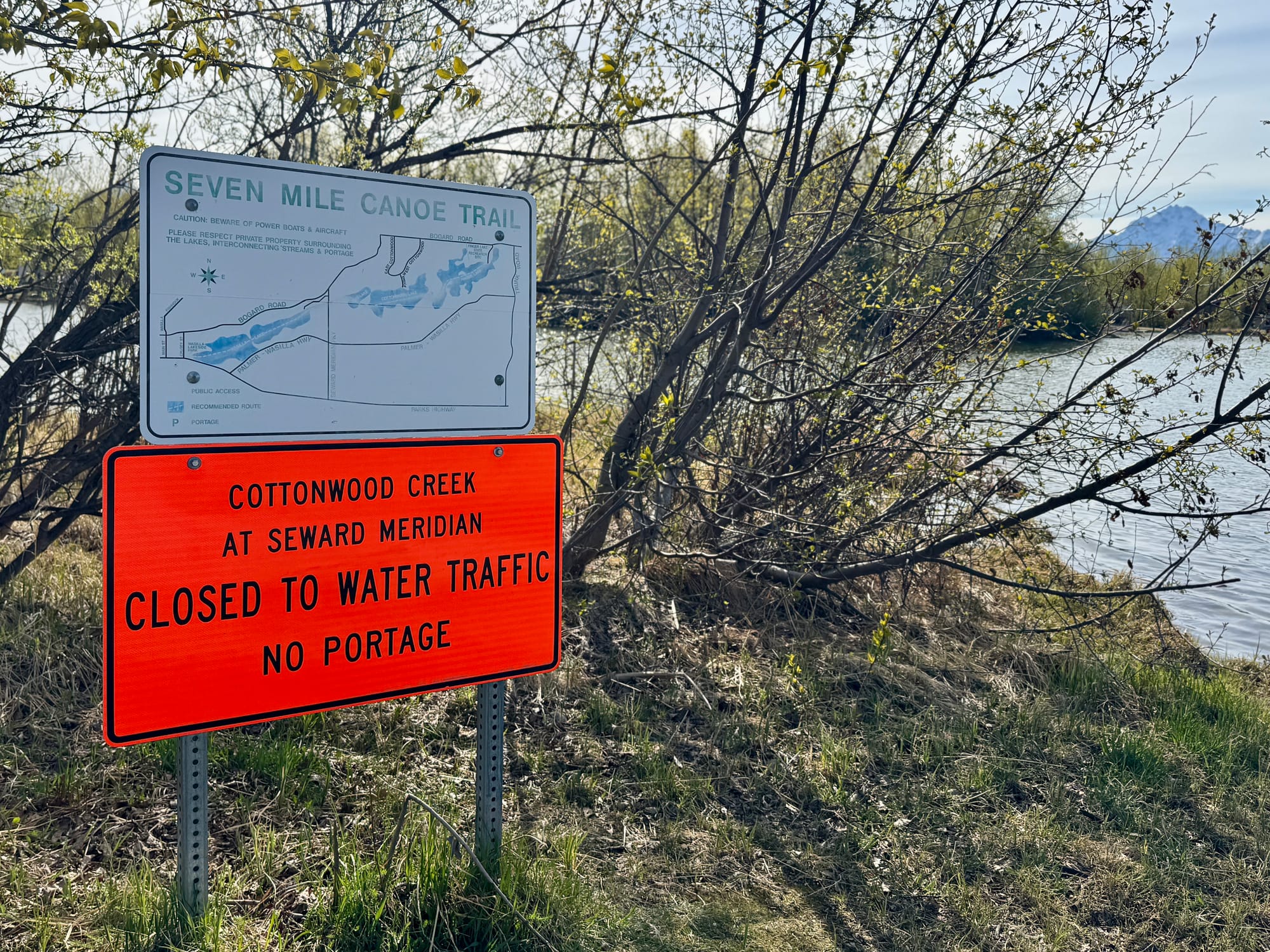 A sign notifies users of the Cottonwood Creek portage closure