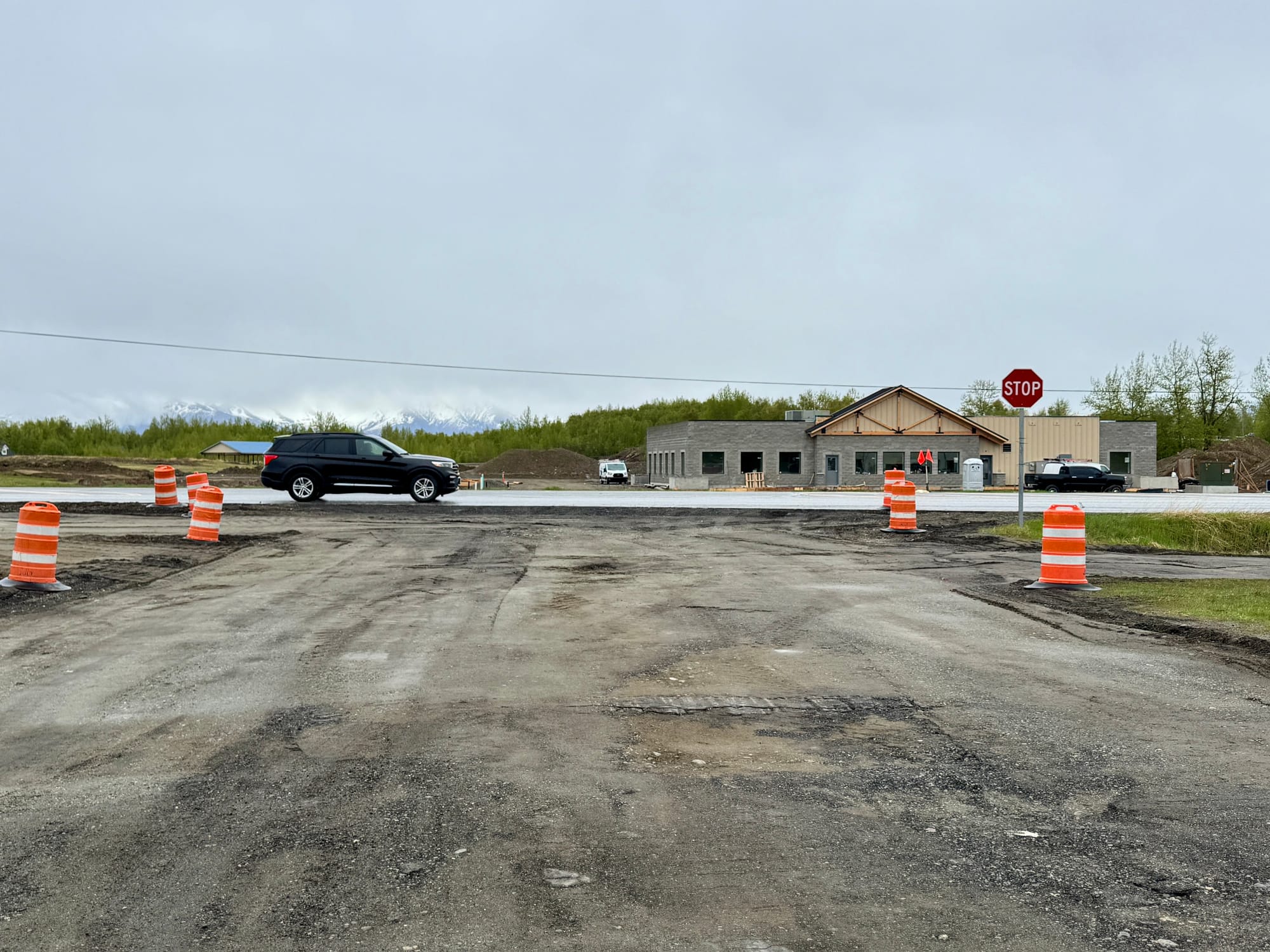 A car travels past the entrance to Cottonwood Elementary School