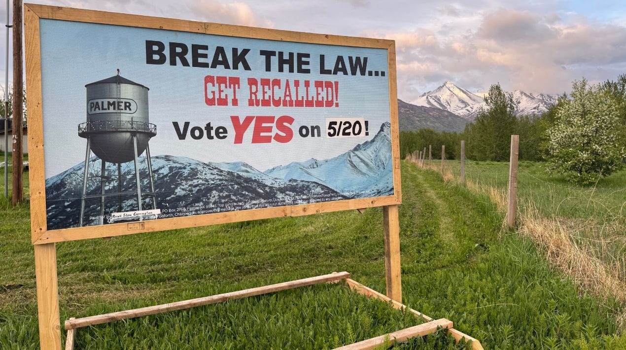 A sign supporting the recall of Palmer Mayor Steve Carrington