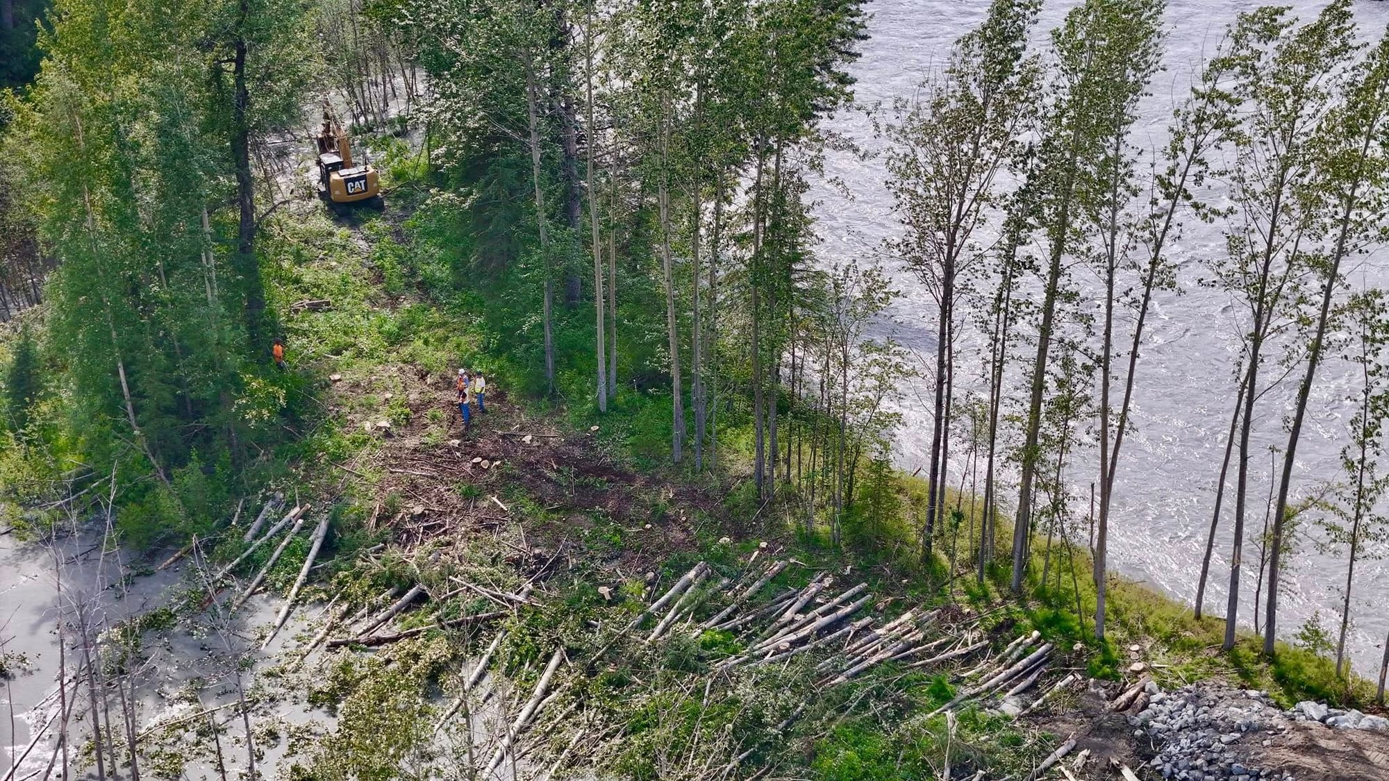 State crews repair the second breach along the Matanuska River