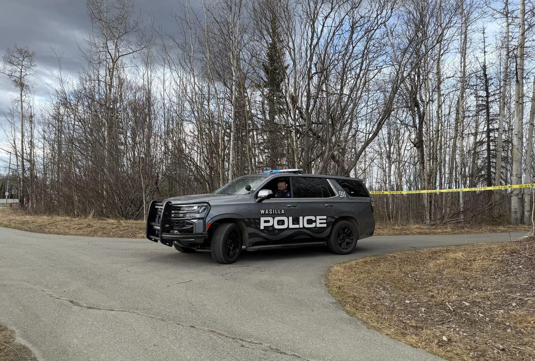 A Wasilla Police Department vehicle blocks a bike path 