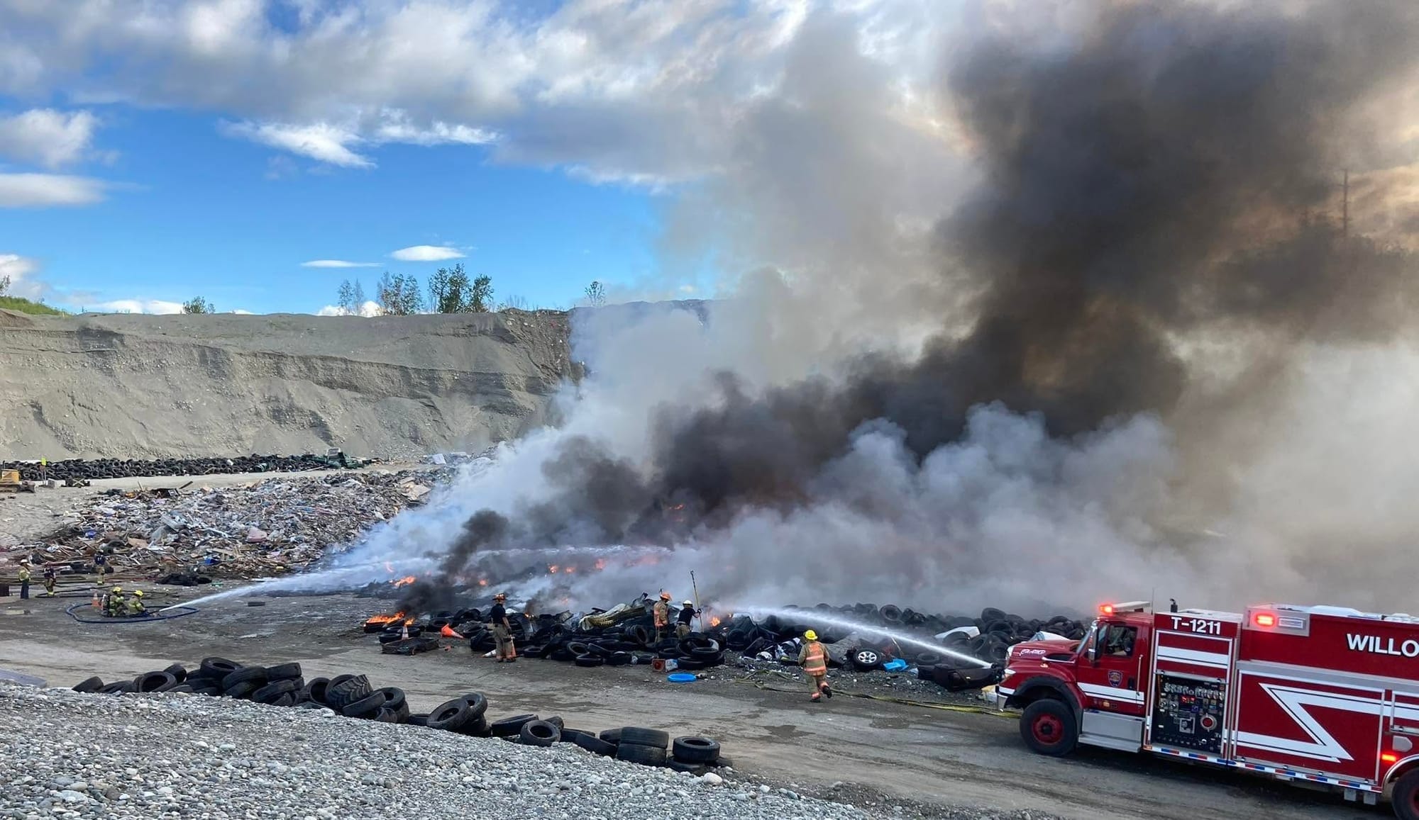 A Willow Fire Department water tender truck battles a fire at the Matanuska-Susitna Borough Central Landfill
