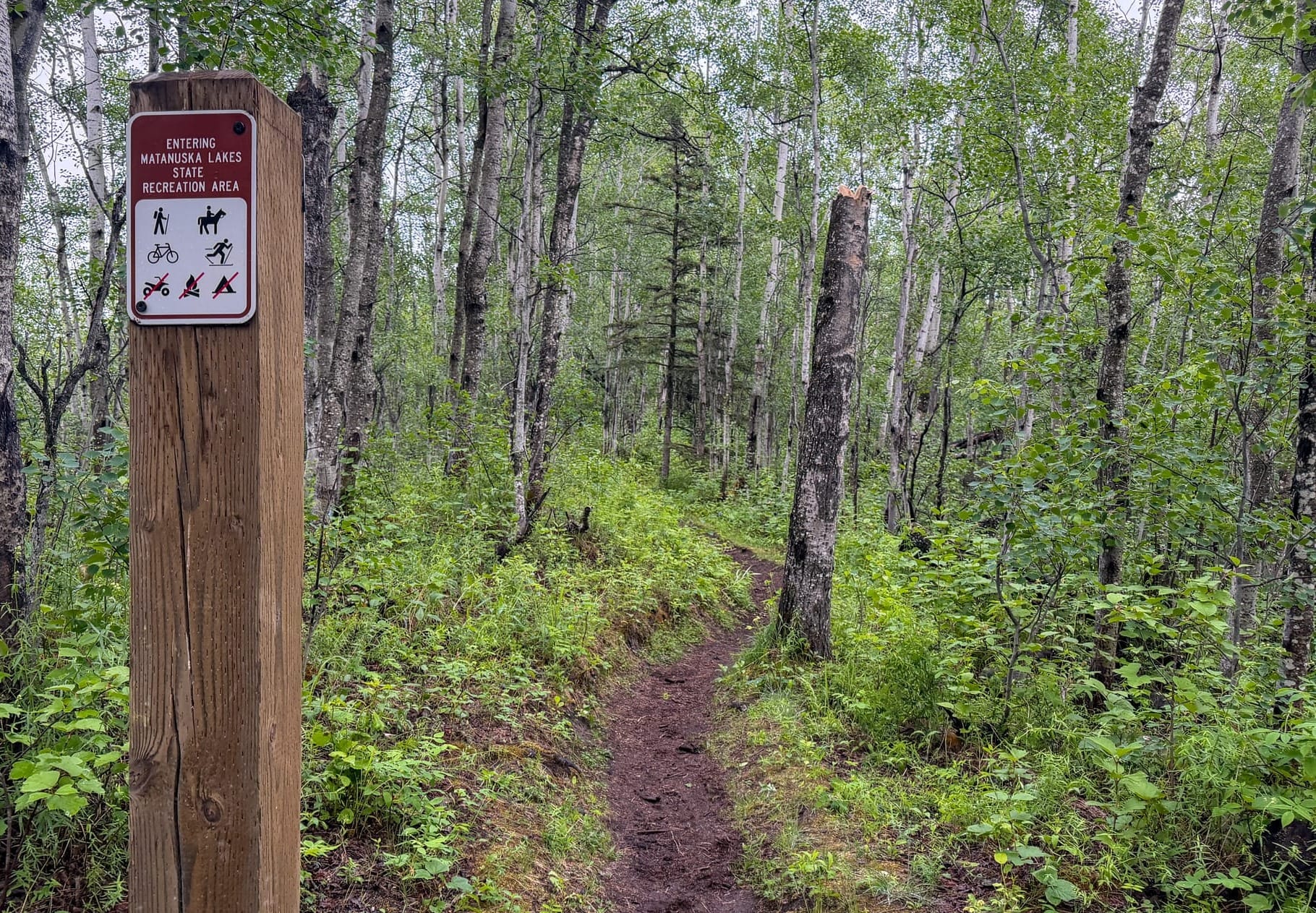 A wayfinding sign shown on July 18, 2026 is designed to help users navigate trails in the Matanuska Greenbelt