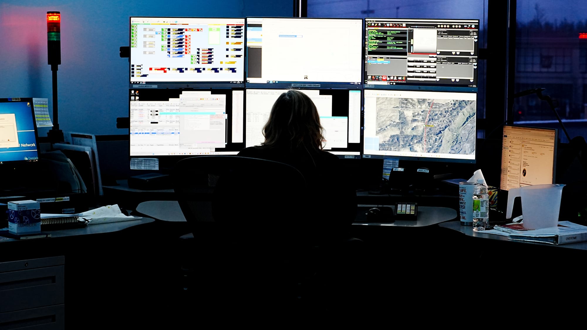 A MATCOM employee processes calls at the MATCOM facility in Wasilla