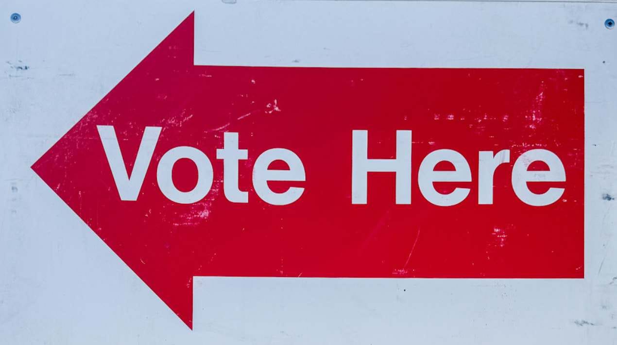 Vote here sign