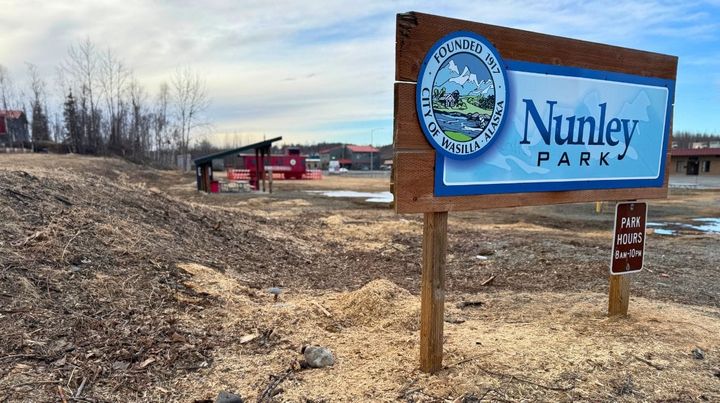 Wood shavings surround a Nunley Park sign in Wasilla