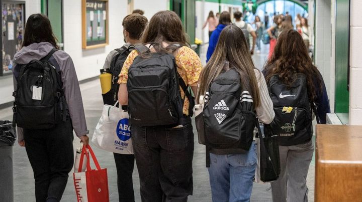 Students enter Colony High School in Palmer on Aug. 15, 2024