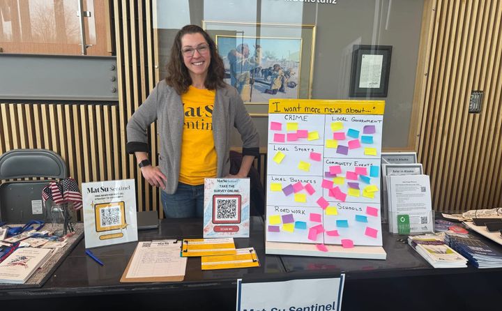 Sentinel founder and editor Amy Bushatz runs a table at the MEA annual meeting