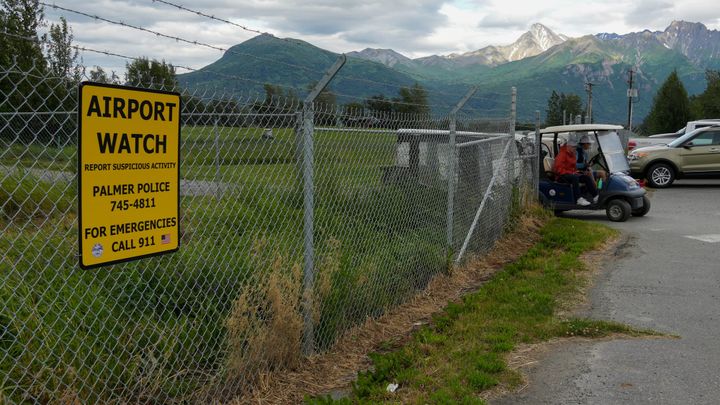 Golfers exit a section of the Palmer Golf Course