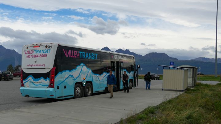 Commuters exit a Valley Transit bus at the Trunk Road Park and Ride