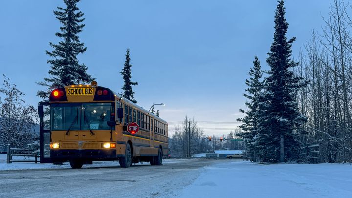 A Matanuska-Susitna Borough School District bus drops students just off the Palmer-Wasilla Highway