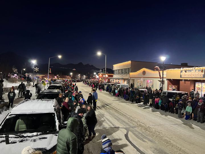 Visitors line the street for the annual Colony Christmas parade