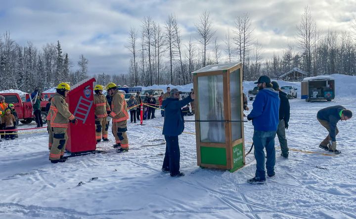 Participants get ready for the Willow Winter Carnival outhouse races.