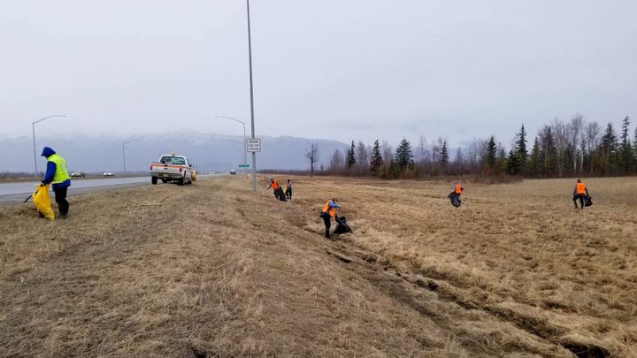 Volunteers collect trash along the Glenn Highway near the Palmer Hay Flats State Game Refuge