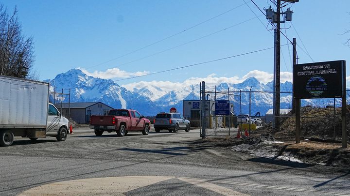 Vehicles sit at the entrance of the Matanuska-Susitna Borough Central Landfill
