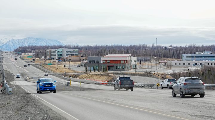 Vehicles travel along Seward Meridian Parkway