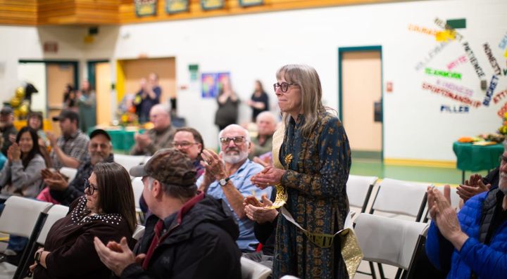 Glacier View Principal Wendy Taylor stands during her retirement celebration