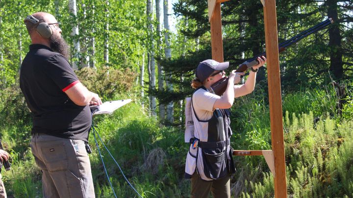Redington Huskies shooter Shelby Burton yells, “Pull!” before making a difficult shot