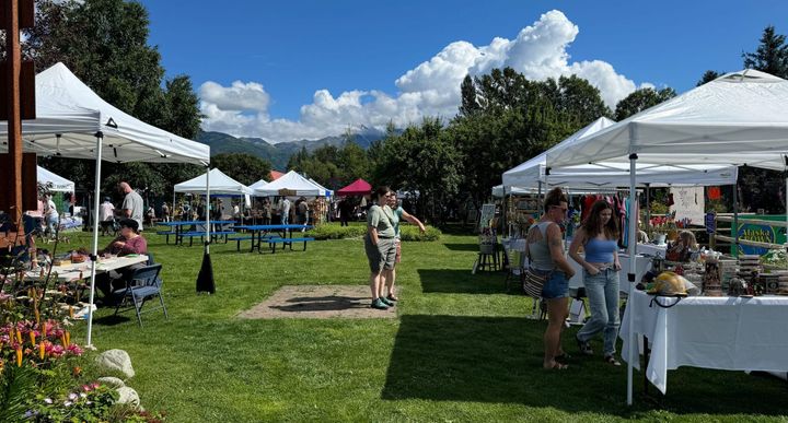 Shoppers browse Arts in the Garden