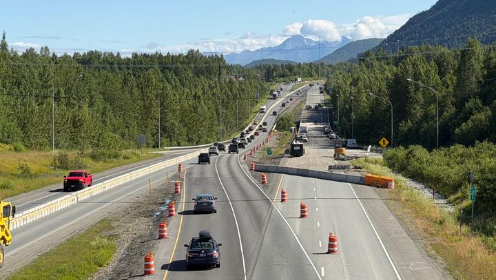 Drivers navigate a closure on the Peters Creek Bridge on the Glenn Highway