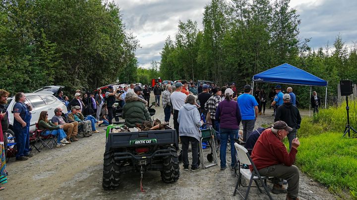 About 100 residents attended a gathering near Drowsy Drive and Peaceful Place in Big Lake