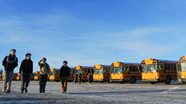 Students walk near school buses at Colony Middle School in January, 2026.