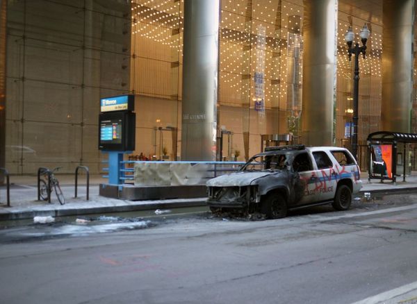 Man admits setting police SUV on fire in riot