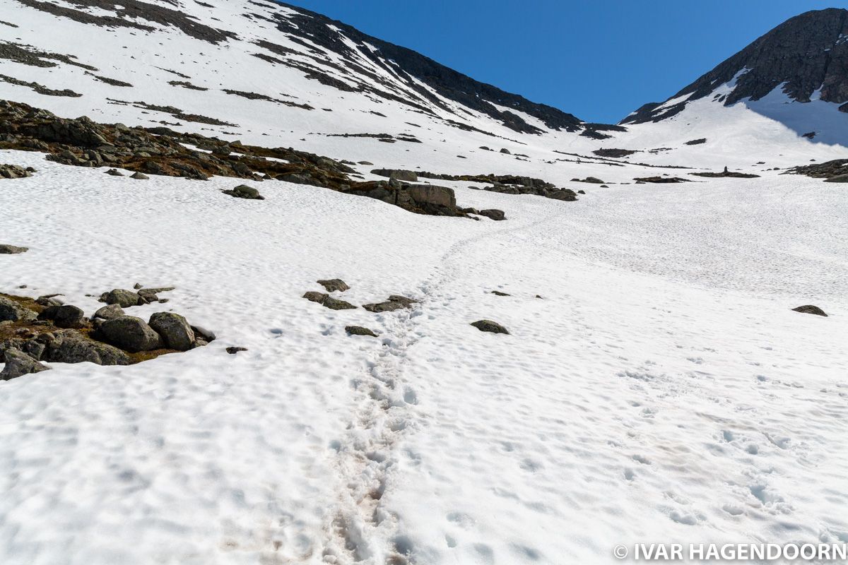 Snowy trail to the top of Mount Skåla, Norway