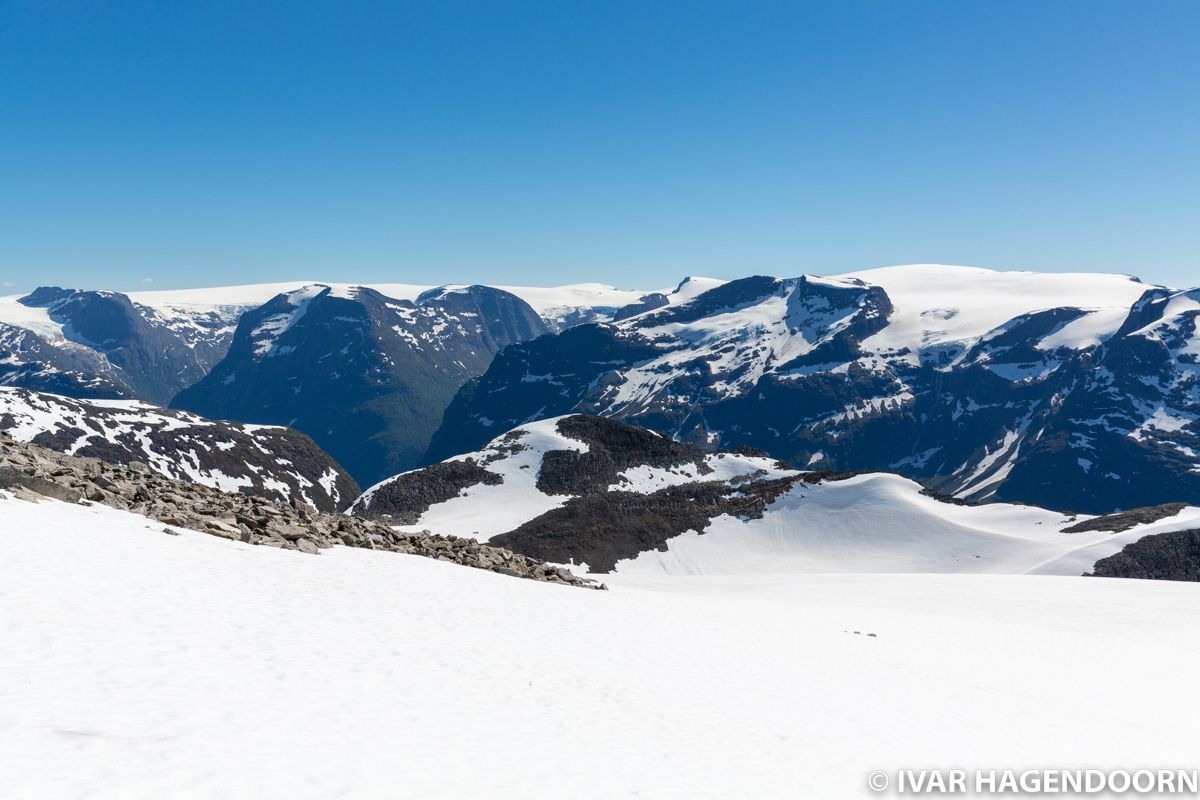 Snow capped mountains as seen from the top of Mount Skåla, Norway