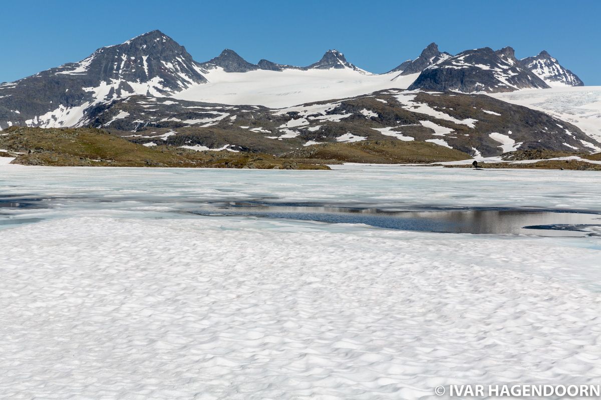 Frozen lake near Sognefjellhytta in Jotunheimen National Park, Norway