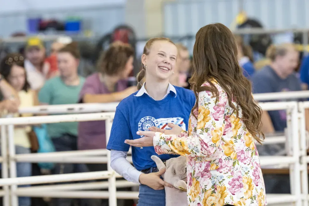 A judge talks to a contestant at the Senior Sheep Showmanship contest during the Kansas State Fair in Hutchinson, Kan. on Sept. 13, 2026. (Dale Grosbach for Citizen Journal)