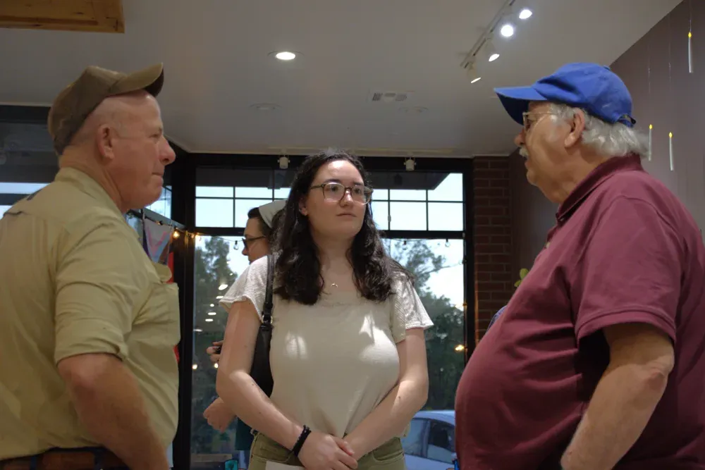 Don Coover speaks with an event attendee in Humboldt, Kan. on Sept. 8, 2026. (Matthew Petillo/Citizen Journal)