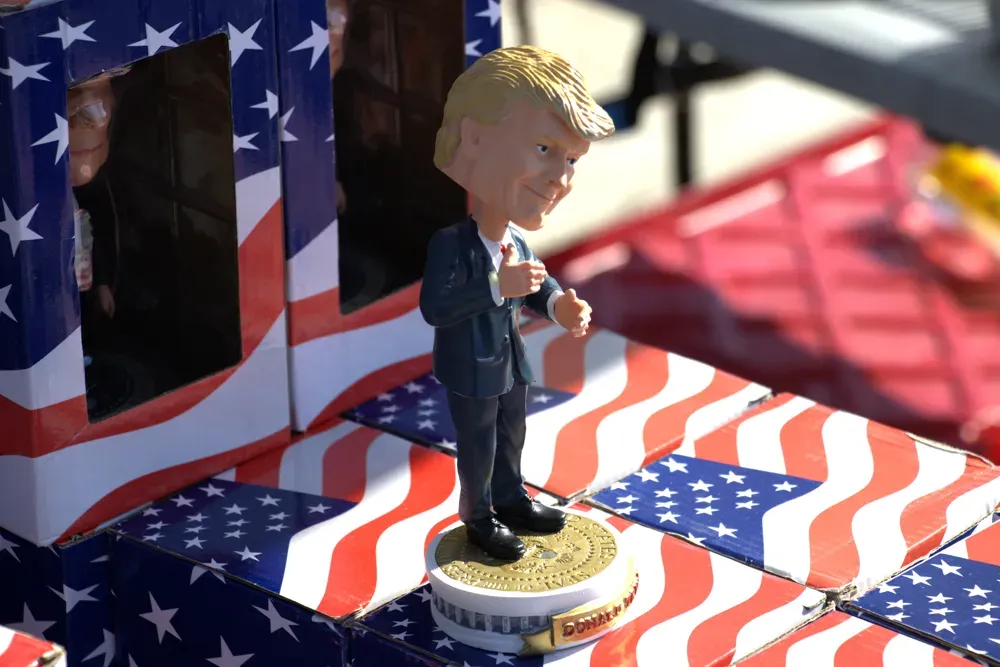 A President Donald Trump bobblehead sits at a vendor's stand for purchase at Vice President JD Vance's rally in Topeka, Kan., on Monday, Oct. 26, 2026. (Matthew Petillo/Citizen Journal)