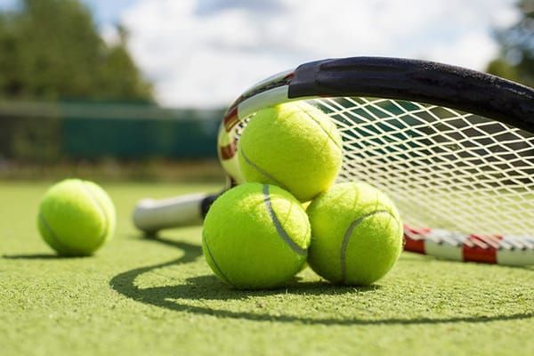 Bullpups grind through tough boys varsity tennis invite