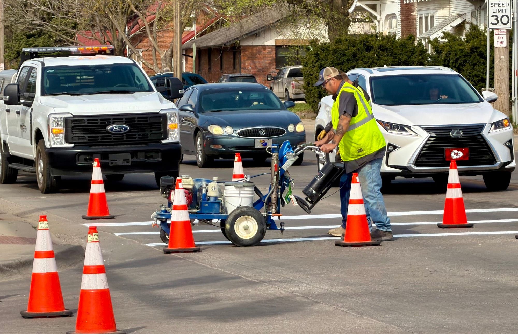 Downtown McPherson gets fresh crosswalk and parking stripes