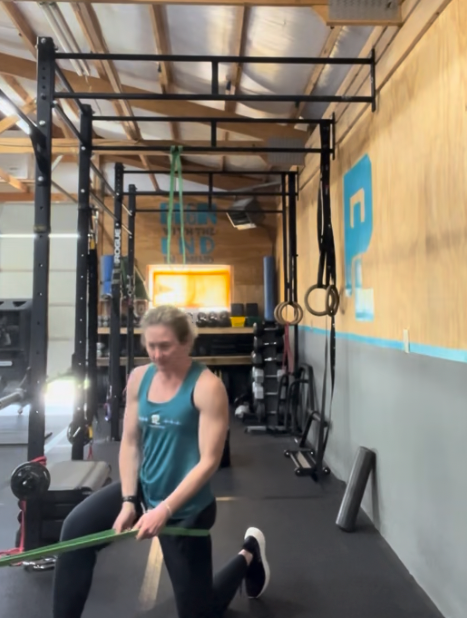 McPherson Gym Owner Shelly Demonstrates Hip Mobility Exercises