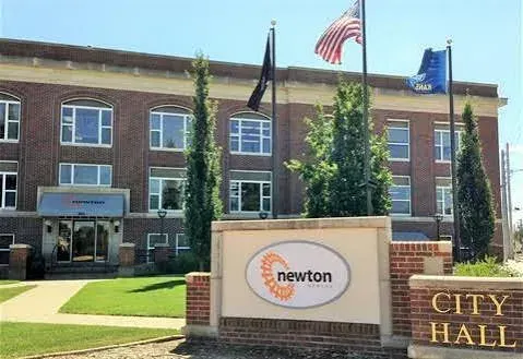 Newton plans to shift credit-card processing fees to customers