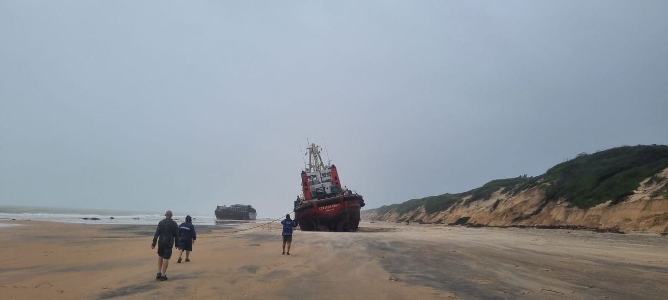 Barge and tug boat for Temane power project beached by Storm Filipo